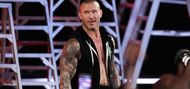 Randy Orton doesn't like announce tables